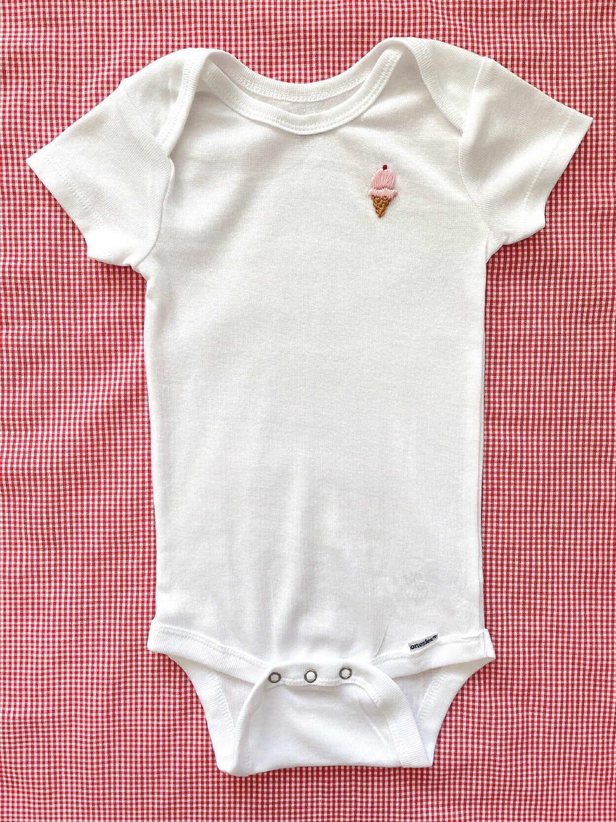 ice cream hand embroidery on white baby onesie