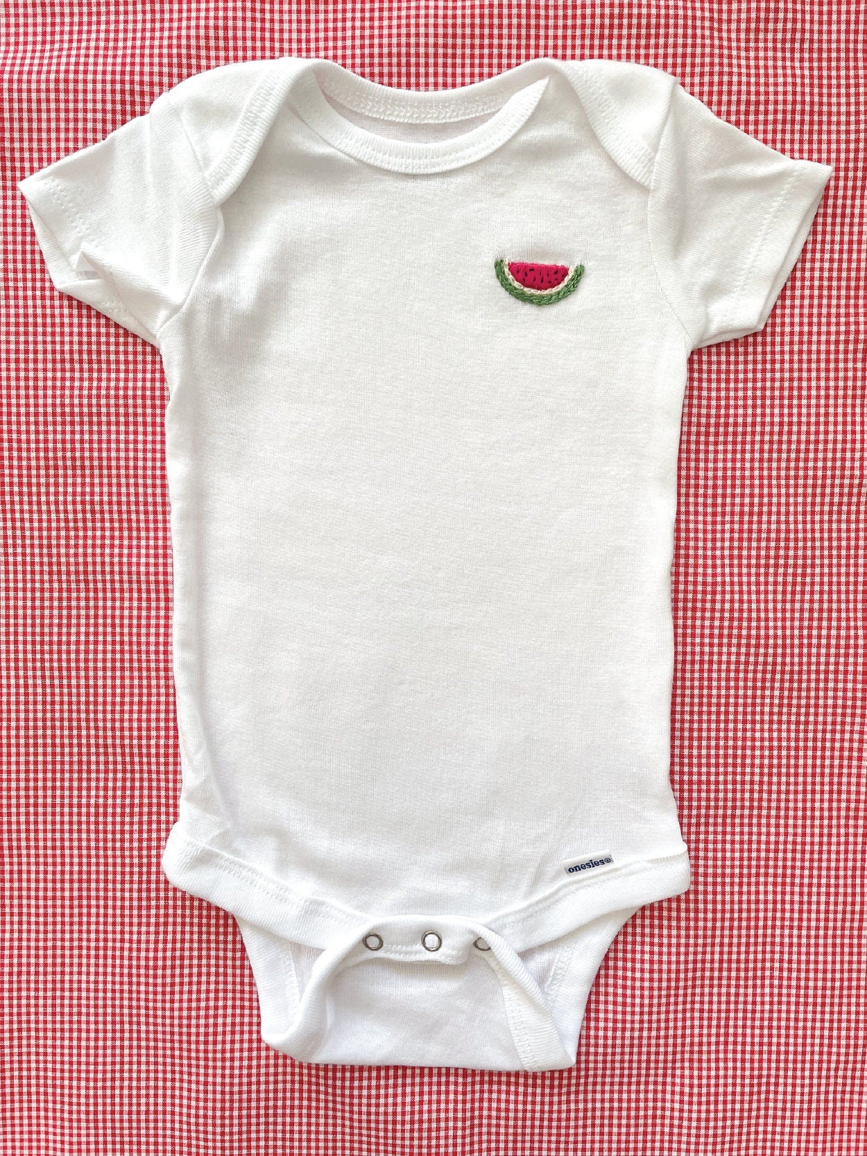 Watermelon hand embroidery on white baby onesie